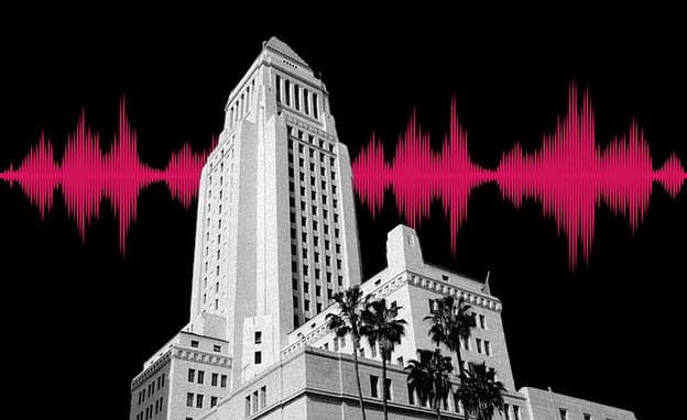 A Los Angeles government building overlayed a black background with vocal waves